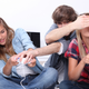 Illustration for article titled Fake Gamers of the Week: Bored Blonde Teenagers with Mismatched Controllers